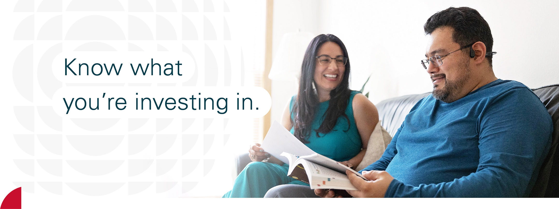Two people looking over a book with the text know what you're investing in.